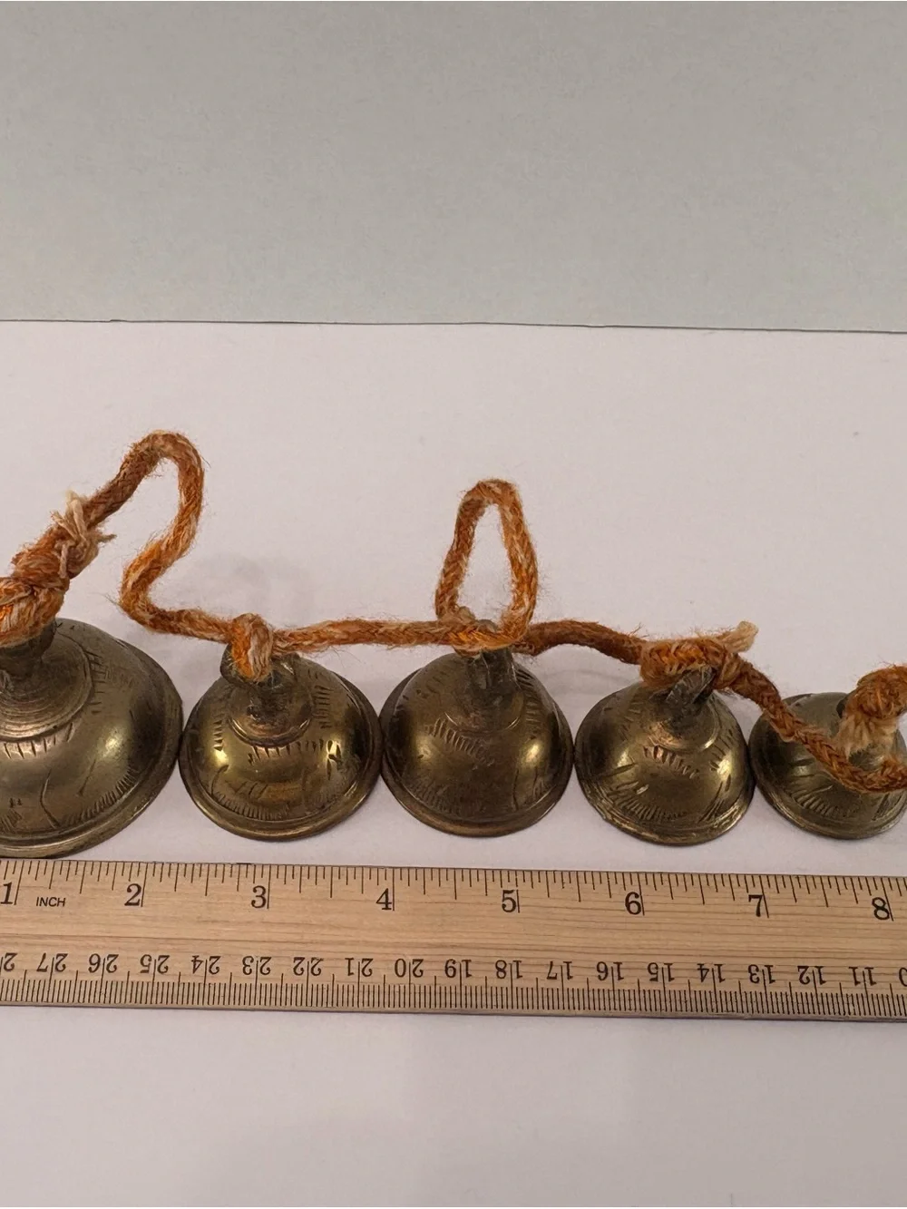 🔔 Vintage Graduated Brass Bells on Rope Garland – Rustic Temple Cow Bells – 24